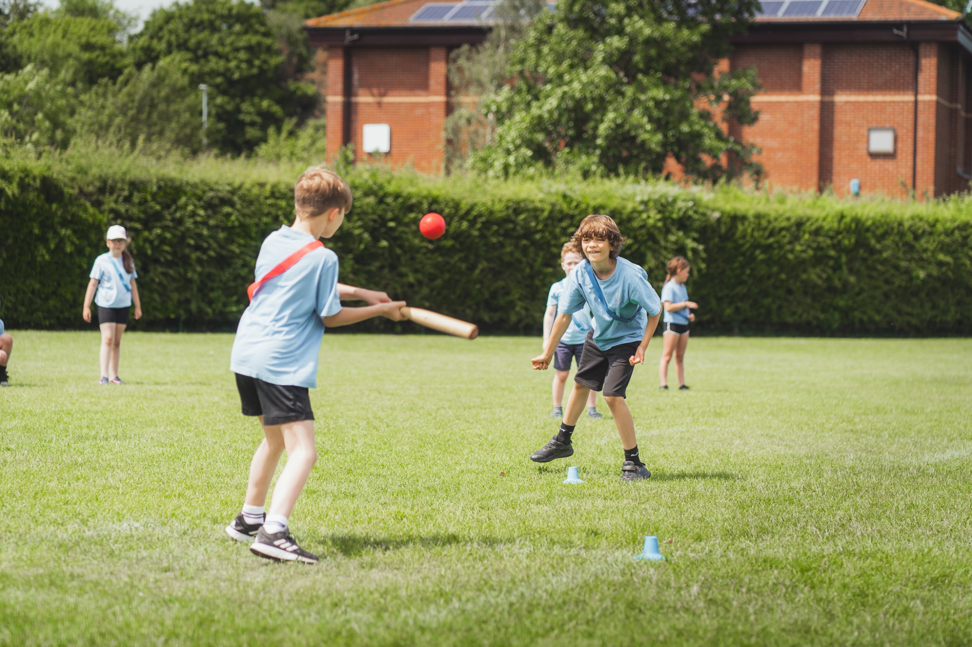 students playing rounders